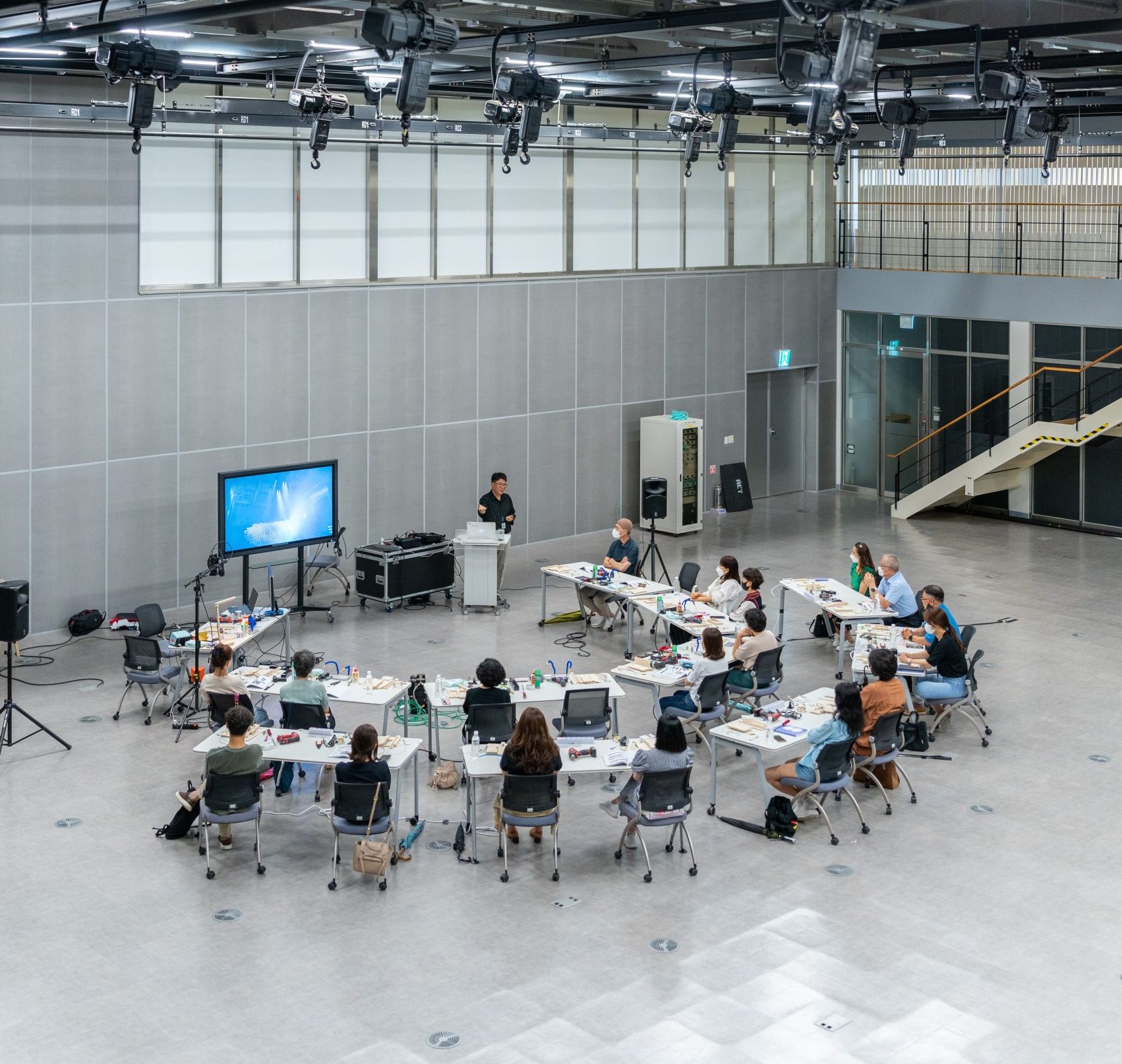 Aerial view of a spacious conference room setup for a business presentation.